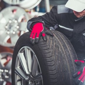 demo-attachment-241-replacing-car-tires-F6SZJYW