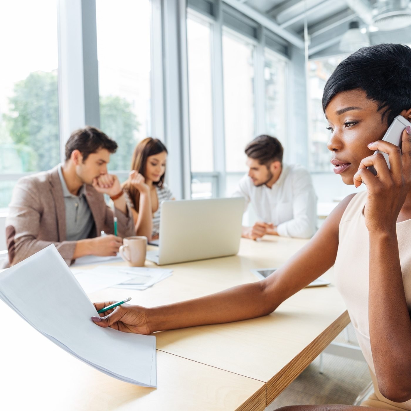 demo-attachment-129-serious-businesswoman-with-documents-talking-on-P9Q6LX6